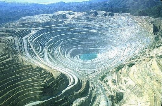 Photo:  Bingham Canyon Mine, Utah, USA, is the biggest open pit mine and the largest, deepest human excavation in the world